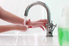 woman-touching-faucet-autotap-hansfree-faucet-image-50